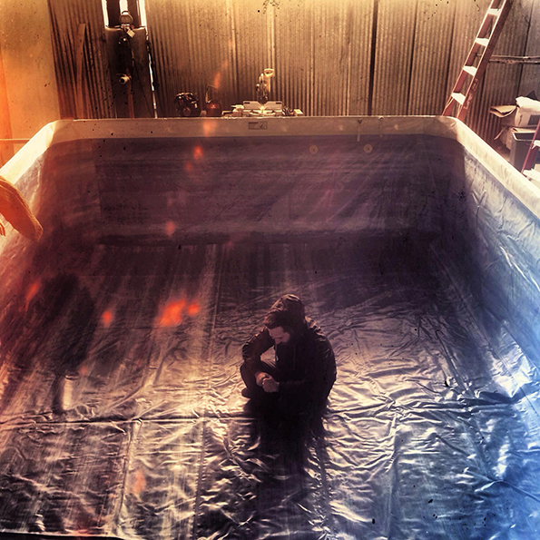 Steven C. Miller prays to the Water Gods on set.