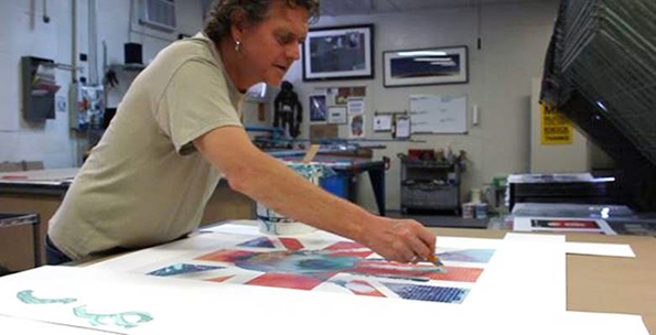Rick Allen hard at work on one of his art pieces.