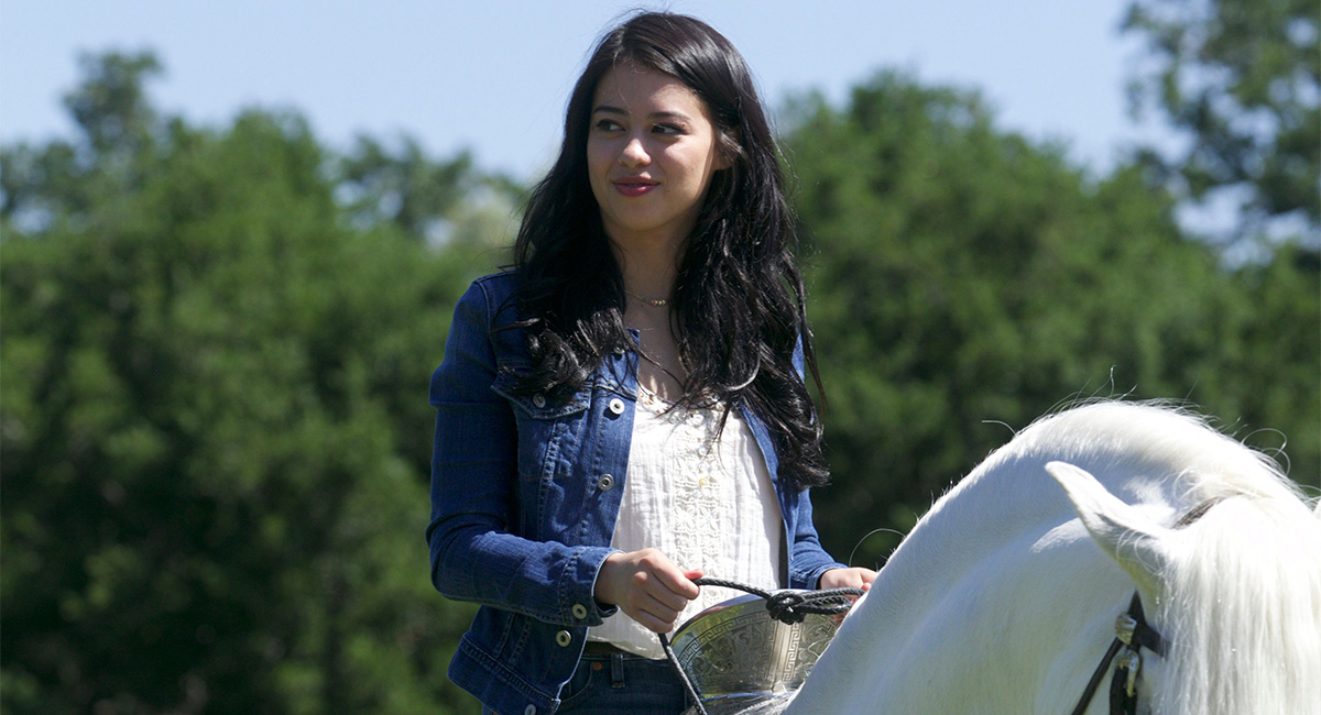 Amber Midthunder on horseback while shooting 'Centurion: The Dancing Stallion.'