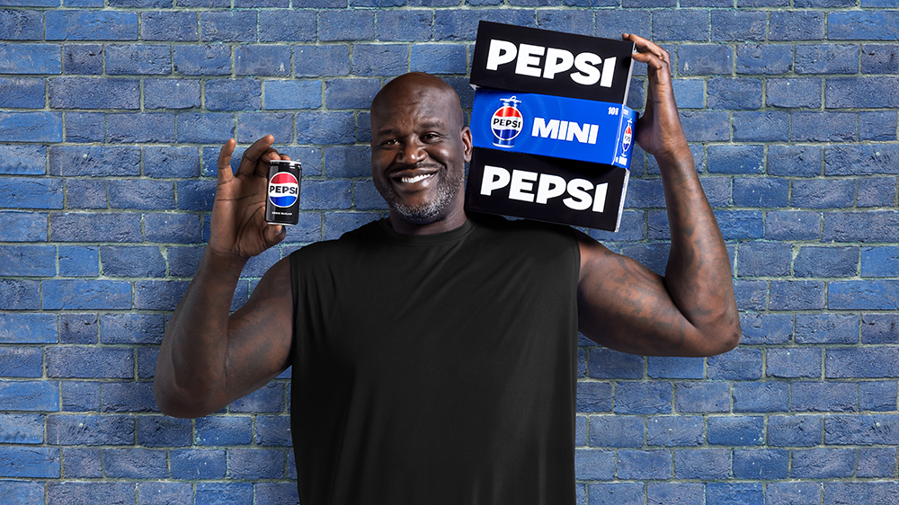 Shaquille O’Neal with Pepsi Mini Cans