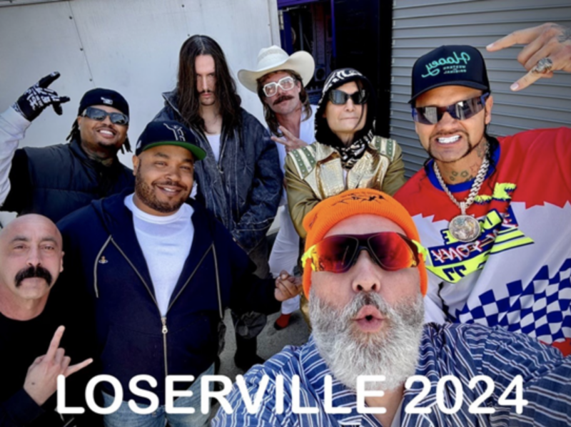 LOSERVILLE line up- Right to Left top line: Xavier Wolfe, Bones, Wes Borland. 2nd Row: N8 No Face, Eddy Baker, Corey Feldman, Riff Raff. Front and Center: Fred Durst